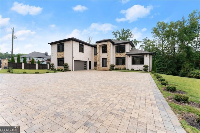 view of front of property with a garage