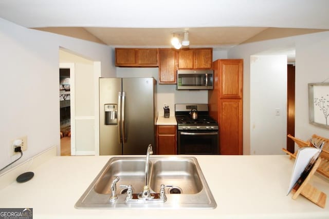 kitchen with stainless steel appliances and sink