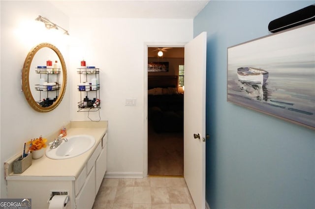 bathroom with vanity, ceiling fan, and tile patterned floors