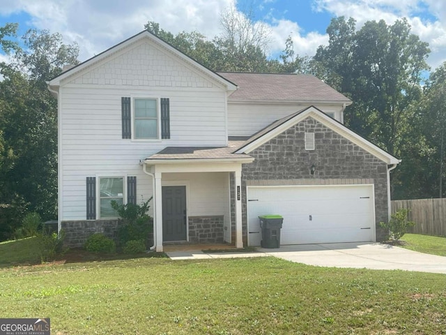 front of property featuring a front yard and a garage