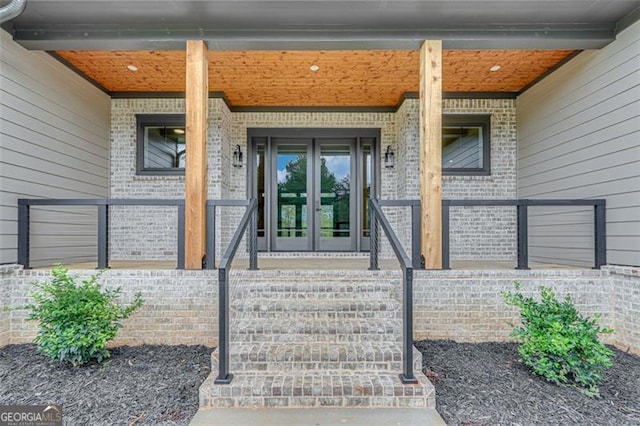 doorway to property featuring french doors