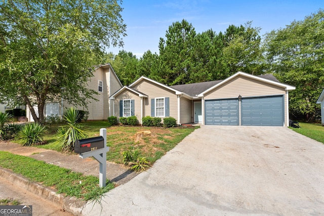 single story home featuring a front lawn and a garage