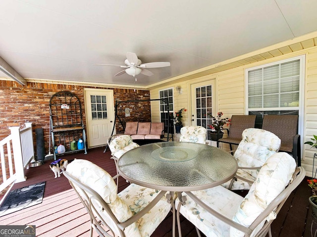 exterior space featuring ceiling fan