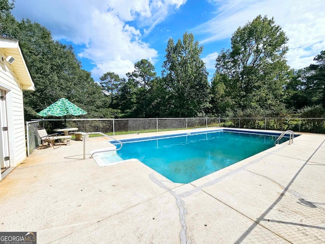 view of pool with a patio