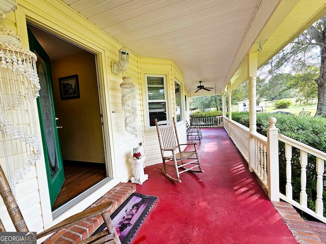 view of patio with ceiling fan and a porch