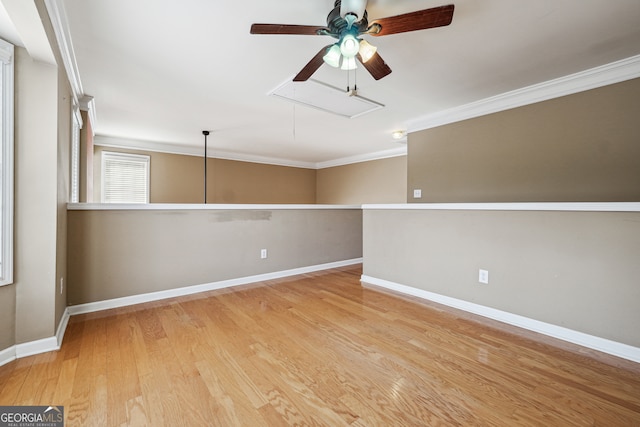 spare room with ceiling fan, light hardwood / wood-style flooring, and ornamental molding