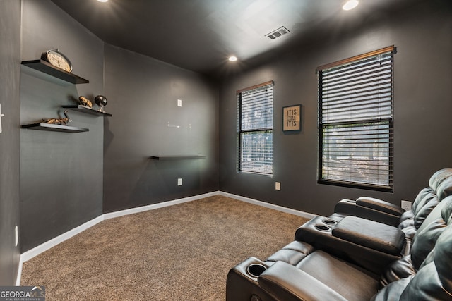 carpeted home theater featuring baseboards, visible vents, and recessed lighting