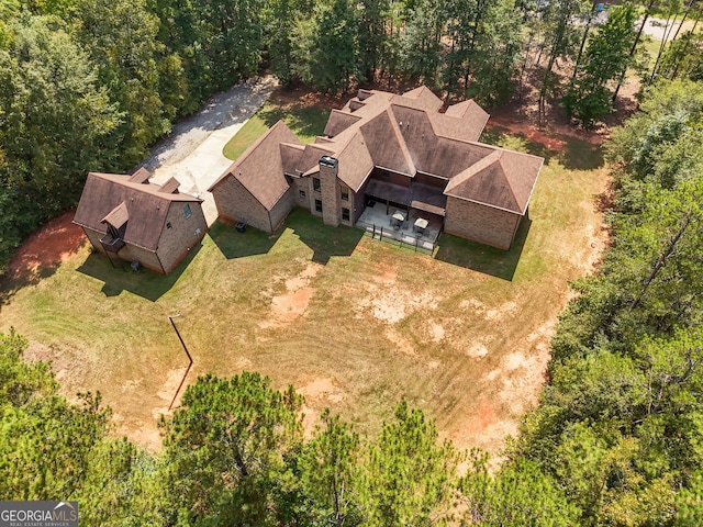 bird's eye view featuring a view of trees