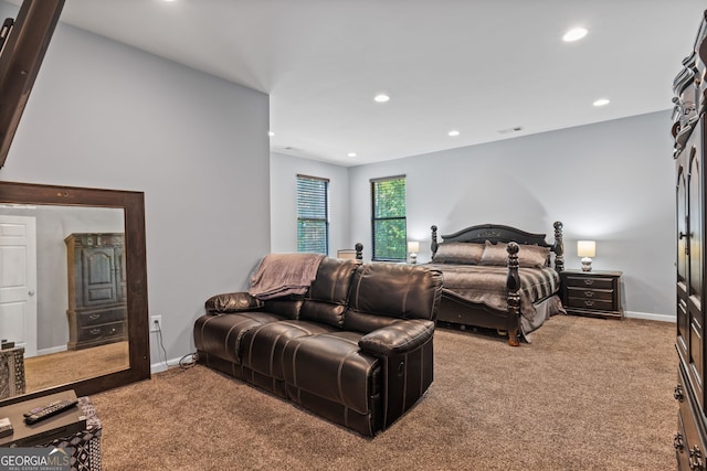 carpeted bedroom with recessed lighting, visible vents, and baseboards