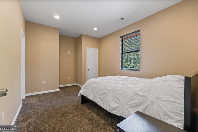 carpeted bedroom featuring visible vents, baseboards, and recessed lighting