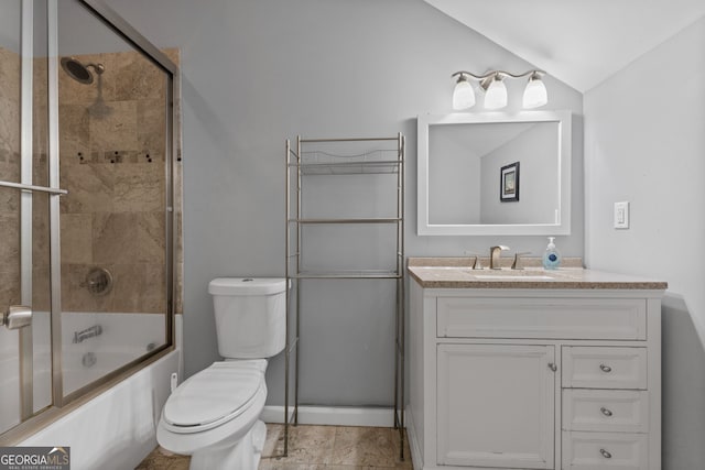 full bathroom with lofted ceiling, bath / shower combo with glass door, vanity, and toilet