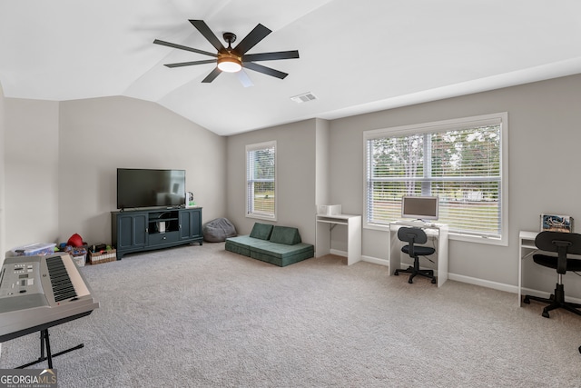 carpeted living room with vaulted ceiling and ceiling fan