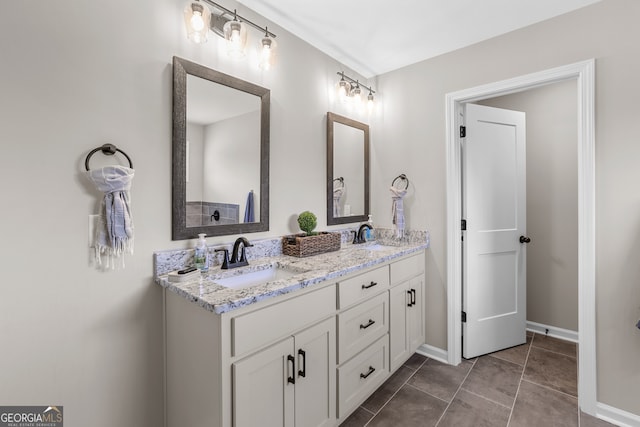 bathroom featuring vanity and tile patterned floors