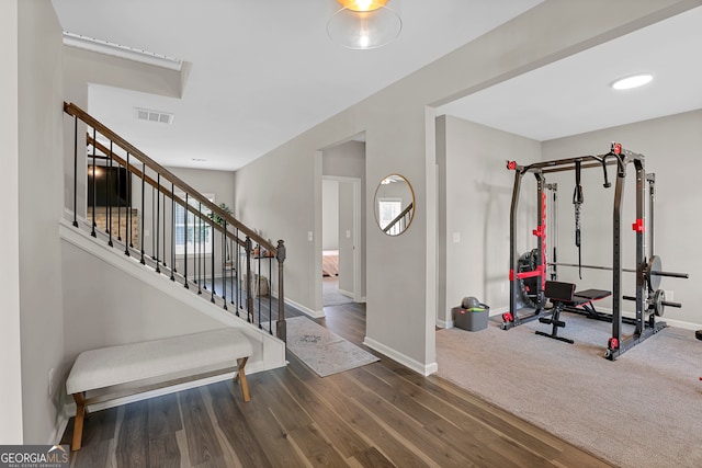 entrance foyer with dark hardwood / wood-style flooring