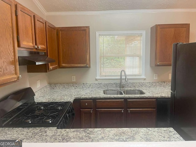 kitchen featuring light stone counters, ornamental molding, sink, a textured ceiling, and black appliances