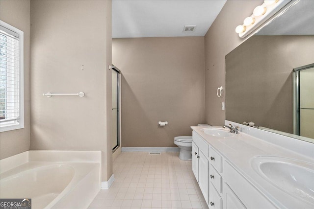 full bathroom with a stall shower, a garden tub, a sink, and visible vents