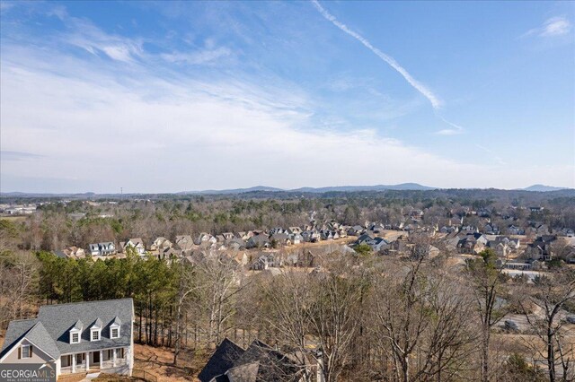 drone / aerial view featuring a mountain view