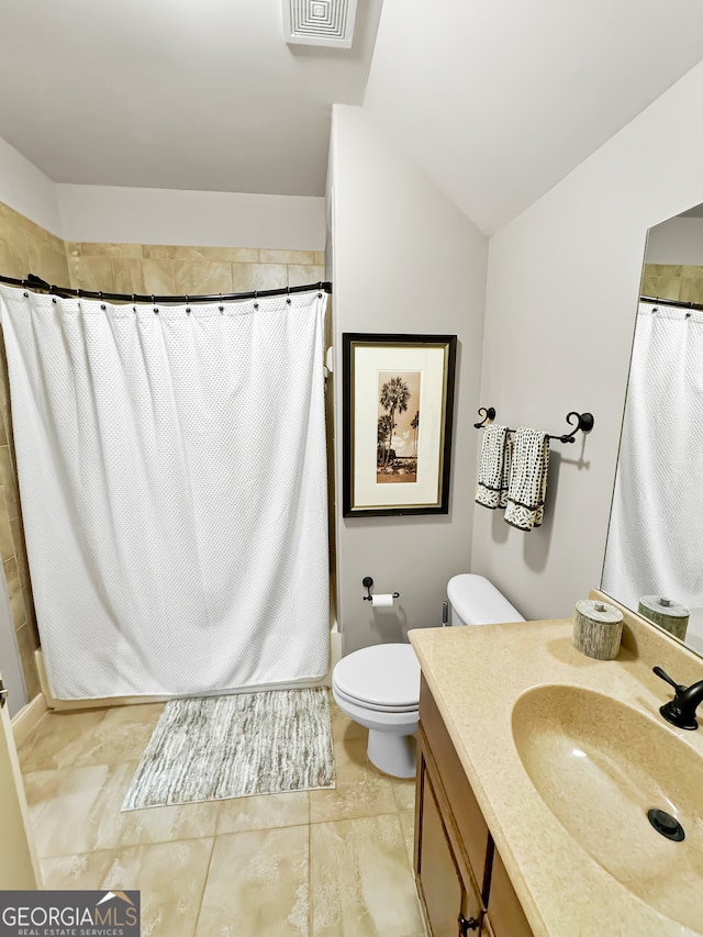 bathroom featuring walk in shower, vaulted ceiling, vanity, and toilet