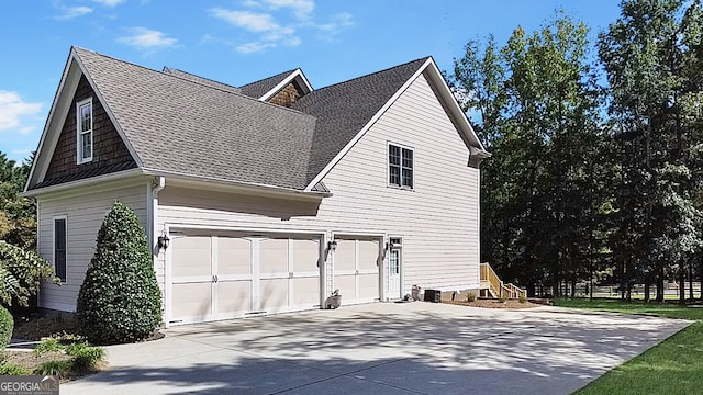 view of property exterior featuring a garage