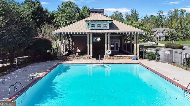 view of pool featuring a gazebo and a patio area