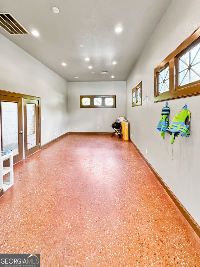 spare room featuring plenty of natural light