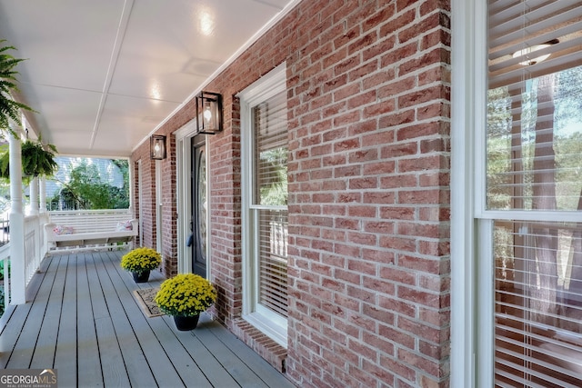 deck featuring covered porch