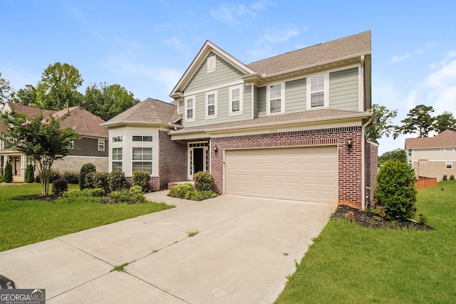 view of front of house featuring a front yard and a garage