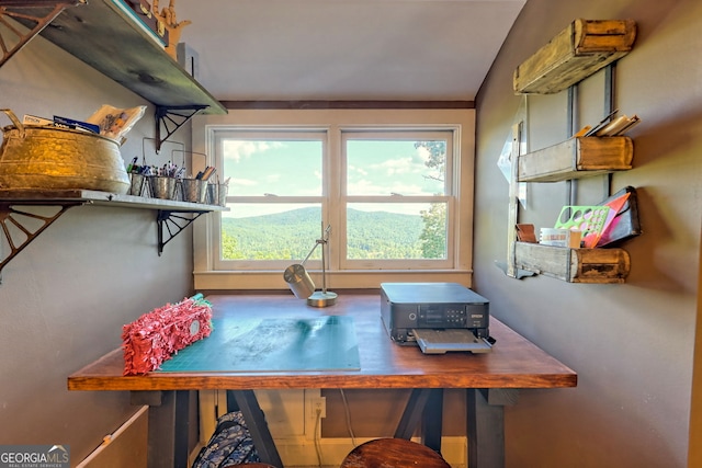 office space featuring a mountain view and plenty of natural light