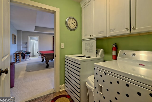 laundry area with carpet, washer and dryer, billiards, and cabinets