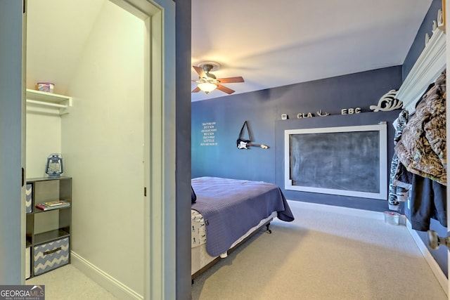 bedroom with ceiling fan and carpet floors