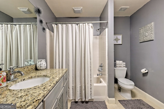 full bathroom with vanity, shower / tub combo, toilet, and tile patterned floors