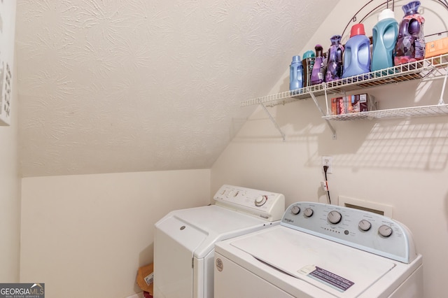 laundry area with washer and dryer