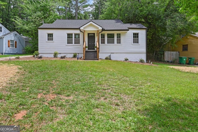 view of front of property with a front lawn