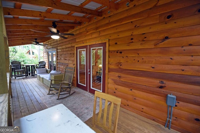 wooden terrace with ceiling fan