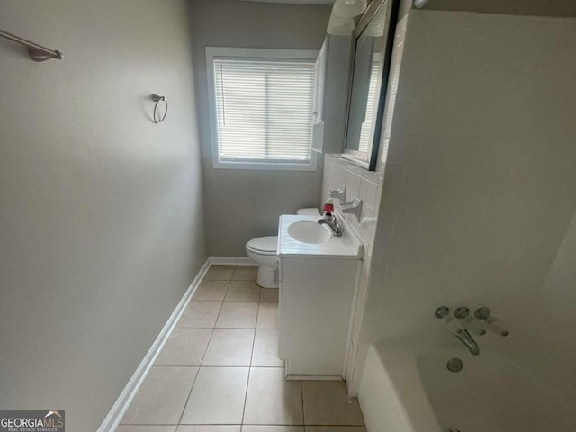 full bathroom featuring vanity, bathing tub / shower combination, toilet, and tile patterned floors