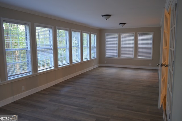 unfurnished sunroom with plenty of natural light