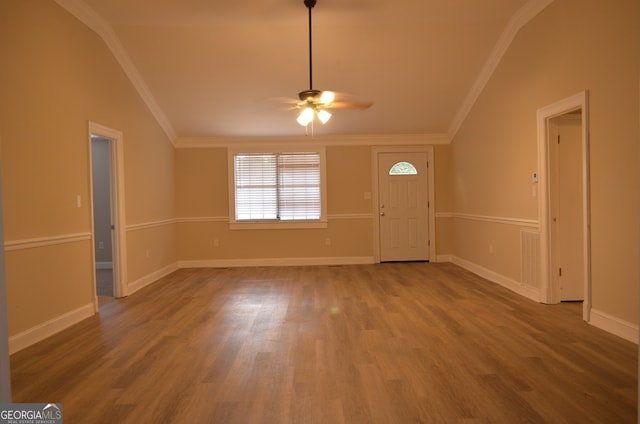 foyer entrance with ceiling fan, hardwood / wood-style floors, and crown molding