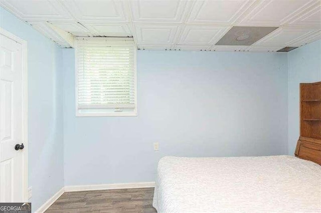 bedroom featuring hardwood / wood-style floors