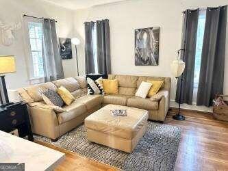 living room featuring hardwood / wood-style floors