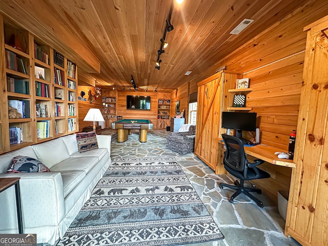 home office featuring pool table, track lighting, wooden ceiling, and wooden walls