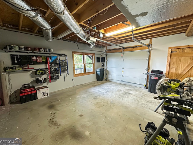 garage featuring a garage door opener