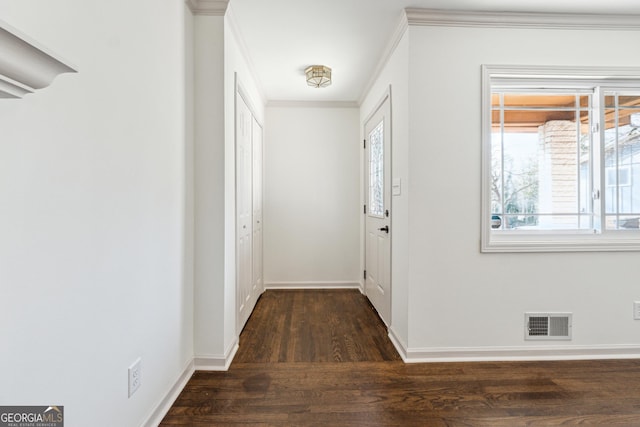 interior space with crown molding and dark hardwood / wood-style floors