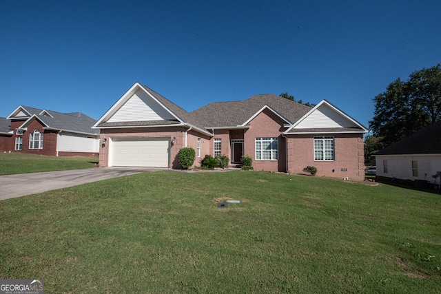 view of front of property with a front lawn and a garage