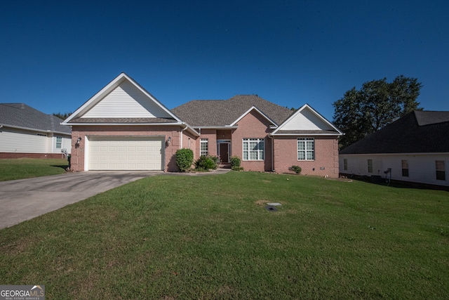 view of front facade with a garage and a front lawn