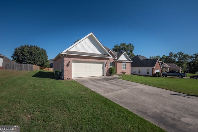 view of front facade featuring a front yard and a garage