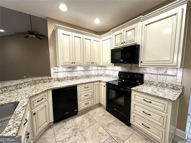 kitchen featuring cream cabinets, tasteful backsplash, and black appliances