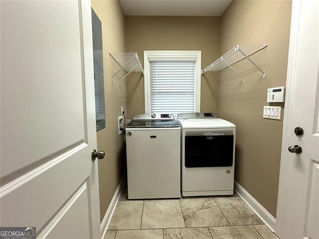 washroom with independent washer and dryer