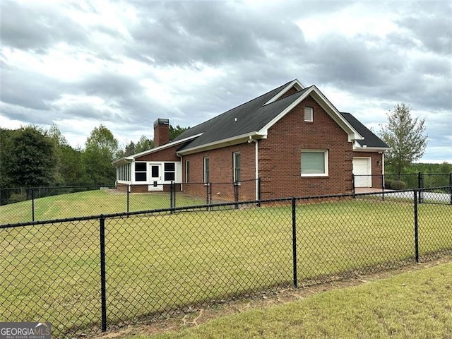 view of property exterior with a yard