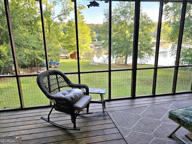 sunroom with a water view