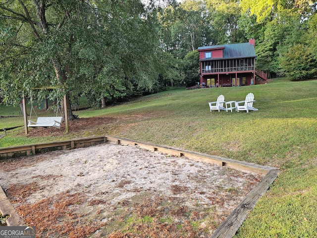 view of yard with a deck